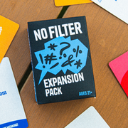 No Filter expansion pack box surrounded by Youphemism cards on a table