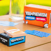 No Filter category cards and box with the You-phemism game box in the background